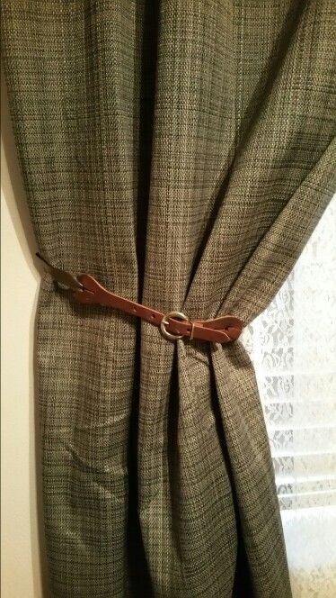 leather belt as a window curtain tieback